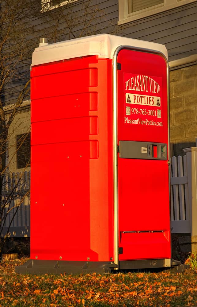 ADA Portable Restroom Rental in Minnesota: a clean standard portable restroom unit set on level ground